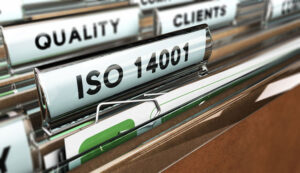 Folders in a drawer with one labeled "ISO 14001"